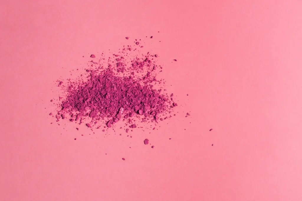 Pink powder on a surface, symbolising substance misuse risks and the need for safe detox support in London.